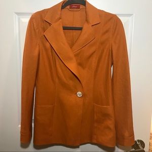 Brioni orange jacket.